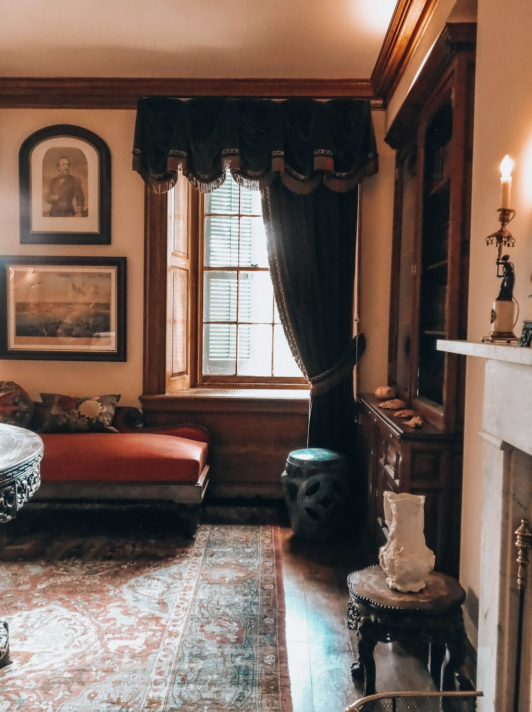 Elegant celebrity living room with vintage furniture and large windows